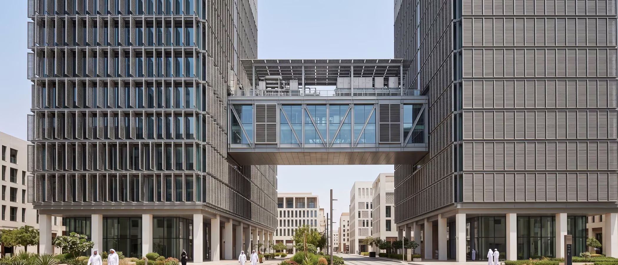 Civic building, two symmetrical wings, one shared plant room between them